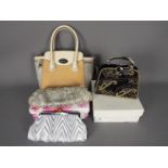 A Jasper Conran handbag and three evening bags.