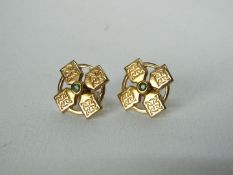 A pair of stone set cross earrings with celtic style decoration, approximately 2.9 grams all in.