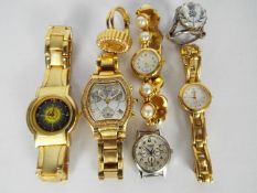 A collection of fashion watches to inclu