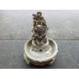 A reconstituted stone garden bird bath /