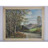 A framed oil on board landscape scene, s