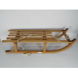 A vintage bentwood sledge.