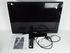A Toshiba 26" flatscreen television, mod