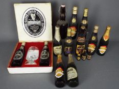 A collection of vintage beer bottles wit