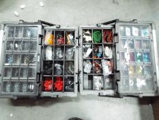 Two accessory organiser boxes, one conta