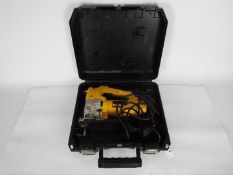 DeWalt - A DeWalt jigsaw in carry case,