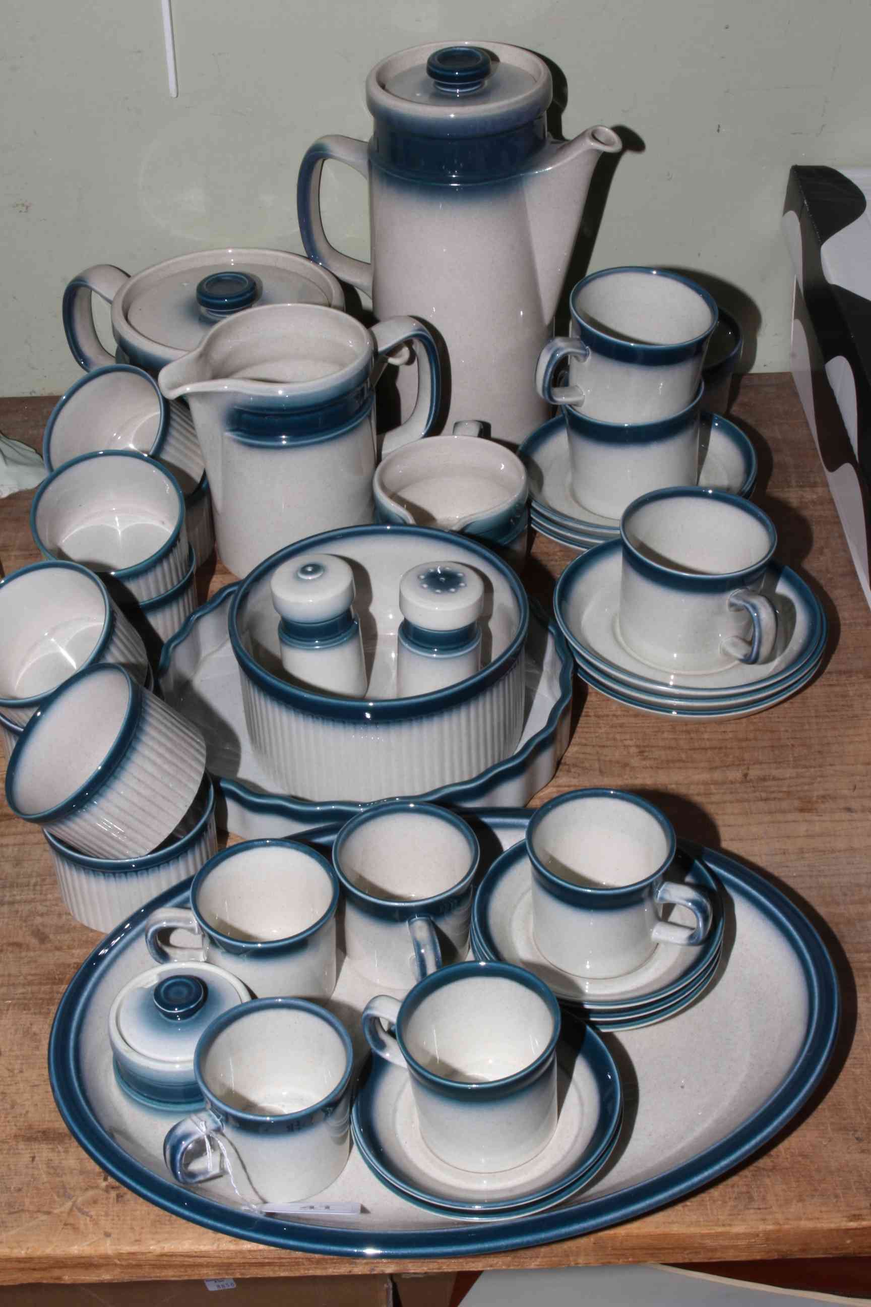 Wedgwood Blue Pacific tableware, thirty eight pieces including coffee and teapots.