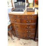 Mahogany bow front five height chest, oak lined and having frieze drawer above two smaller drawers,