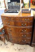 Mahogany bow front five height chest, oak lined and having frieze drawer above two smaller drawers,