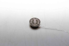 Silver mounted and mother of pearl horse shoe lapel button, 1.75cm diameter.