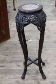 Oriental circular carved hardwood and marble inset top jardiniere stand, 91cm by 28cm diameter.