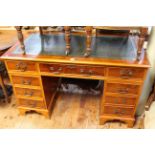 Yew wood finish twin pedestal desk with leather top and office chair (2).