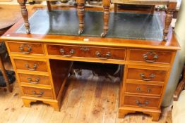 Yew wood finish twin pedestal desk with leather top and office chair (2).