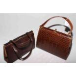 Two vintage skin handbags.