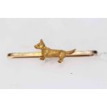 9 carat gold Terrier bar brooch, 4.5cm across.