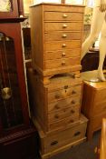 Light oak three height chest, small four drawer pedestal, six drawer specimen chest,