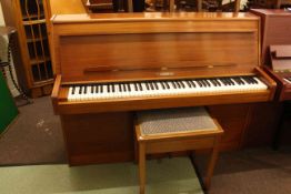 Linder, Ireland overstrung piano and stool, 138cm wide.