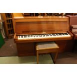 Linder, Ireland overstrung piano and stool, 138cm wide.