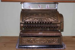 Vintage brass National Cash Register by The National Cash Register Co, Dayton, Ohio, USA.