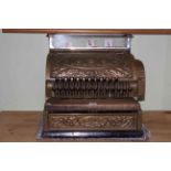 Vintage brass National Cash Register by The National Cash Register Co, Dayton, Ohio, USA.