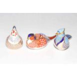 Three Royal Crown Derby paperweights, Hen and two other birds, to gold stoppers.