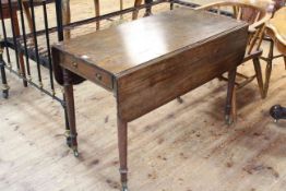 Early 19th century mahogany Pembroke table with single frieze drawer raised on turned tapering legs.