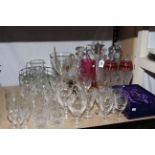 Collection of glass including decanters, claret jug, crystal and other glasses, etc.
