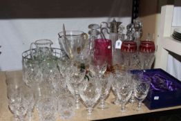 Collection of glass including decanters, claret jug, crystal and other glasses, etc.