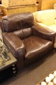 Brown leather armchair.