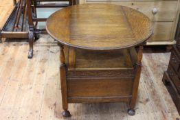 Early 20th Century Monks chair with circular carved top.