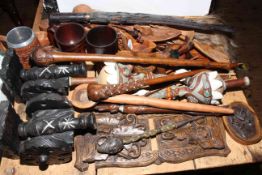 Collection of wood carving including ethnic pieces, knife, book slide, and ivory bead set stick.