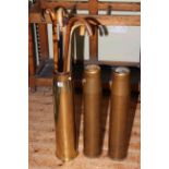 Large brass shell case and collection of walking sticks. Condition: Height 60cm, condition good.