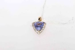 14 carat gold, brilliant cut tanzanite and 18 brilliant cut diamonds pendant,