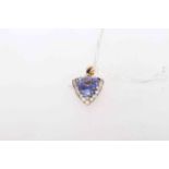 14 carat gold, brilliant cut tanzanite and 18 brilliant cut diamonds pendant,