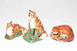 Three Royal Crown Derby paperweights, Vixen, Otter and Fox Cub, all gold stoppers.