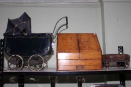 Tin plate antique dolls pram, oak slope front writing box and small stool.