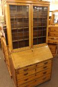 Oak leaded glass door, and four drawer bureau bookcase 92cm wide, 195cm high, 50cm deep.