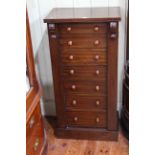 Mahogany Wellington chest with seven graduated drawers with turned knob handles, 53.5cm wide, 106.