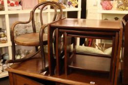 Nest of three mahogany tables, oak sewing table with contents, and child's bentwood rocker (3).