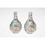 Pair antique Chinese porcelain vases having relief dragon decoration, blue glazed bases, 13cm.