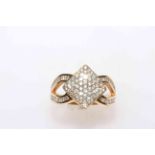 18 carat yellow gold and diamond set ring having lozenge shape pavé set with over fifty brilliants