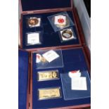 Collection of gold plated bars, medals and nickel coins,