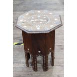 Octagonal Moorish table with detachable top and folding base,