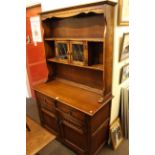 Old Charm style dresser, refectory table and set of six chairs.