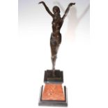 Bronze model of an Art Deco style dancing girl on marble plinth, 54cm high.