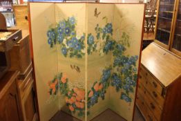 Two Oriental four fold dressing screens, each decorated with butterflies and flowers (modern).