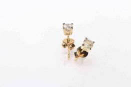 Pair 14 carat gold, diamond stud earrings, with gemological certificate.