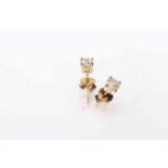 Pair 14 carat gold, diamond stud earrings, with gemological certificate.