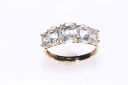 9 carat gold and five stone quartz ring, size P.