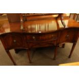 Reproduction mahogany serpentine front sideboard, four drawer bureau, sofa table,
